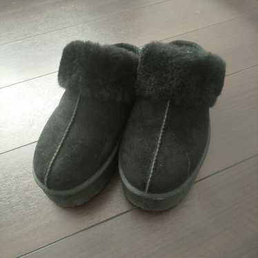 Black suede fur-lined shearling boots