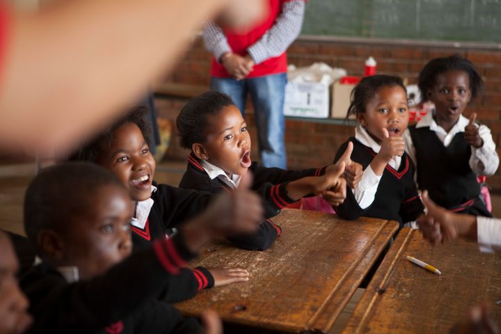 JOHANNESBURG, SOUTH AFRICA - OCTOBER 15: Children learn to wash their hands with Lifebuoy soap, at Margeret Gwele Primary School, Soweto, on October 15, 2012 in Johannesburg, South Africa. Celebrated in over 100 countries, Global Handwashing Day is an annual awareness day which aims to put the global spotlight on handwashing with soap as a lifesaving habit. (Photo by Greg Marinovich/Getty Images for Unilever)