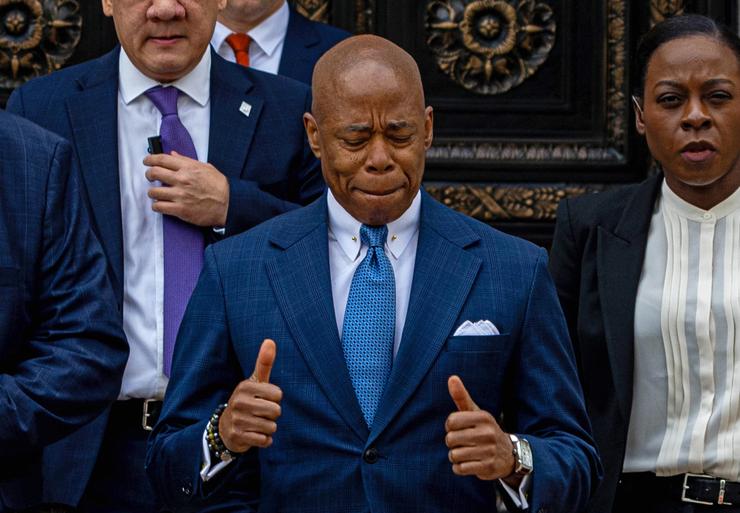 Mayor Eric Adams exits the Thurgood Marshall Courthouse after making the first appearance in his corruption case on Wednesday in New York City. Adams has been charged with five offenses: conspiracy to commit wire fraud, federal program bribery, solicitation of a contribution by a foreign national, wire fraud, and bribery. 