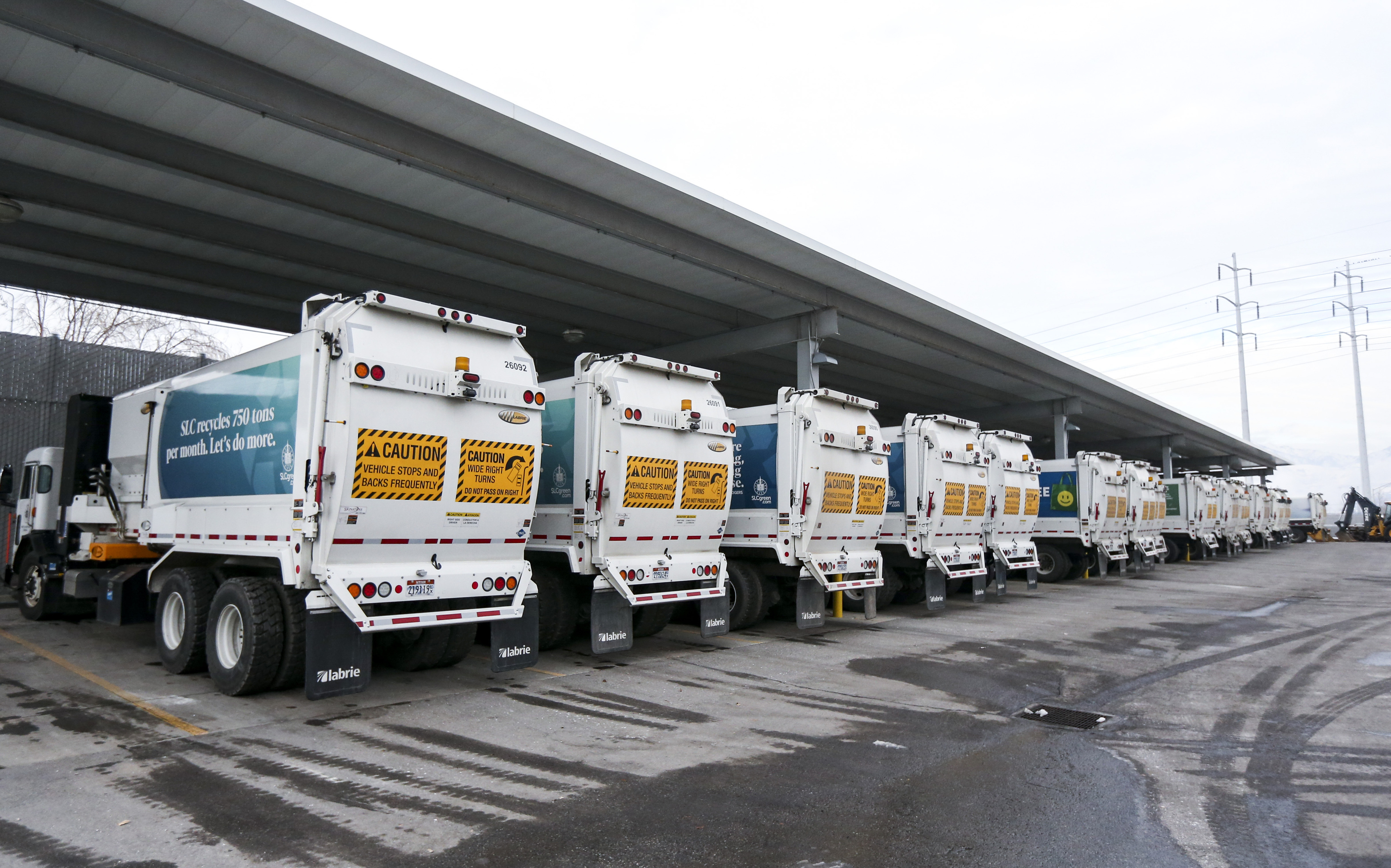 Garbage trucks sit in bays at the Salt Lake City Department of Public Services maintenance facility in Salt Lake City on Dec. 2, 2019. The city is changing its garbage collection schedule next month for the first time since the 1980s.