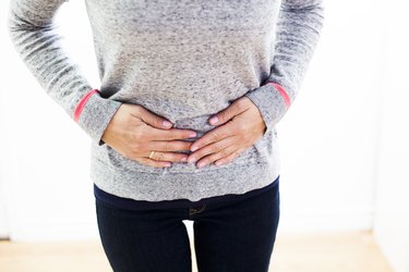 Woman with stomach pain