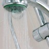 showerhead against tan wall