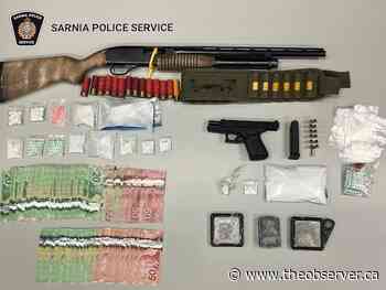 Guns, drugs seized in searches, three charged: Sarnia police