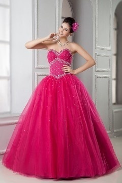 Robe de soirée princesse fuchsia bustier coeur corsage pailleté