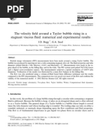 The Velocity Field Around A Taylor Bubble Rising in A Stagnant Viscous Uid: Numerical and Experimental Results