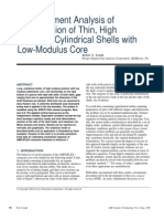 Finite Element Analysis of Compression of Thin, High Modulus, Cylindrical Shells With Low-Modulus Core