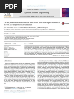 On The Performance of A Vertical Helical Coil Heat Exchanger. Numerical Model and Experimental Validation