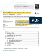 A Review of T-Stress and Its Effects in Fracture Mechanics