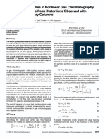 Study of Peak Profiles in Nonlinear Gas Chromatography - Application To The Peak Distortions Observed With Overloaded Capillary Columns