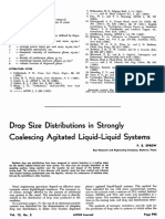 Size Distributions in Strongly Coalescing Agitated Liquid-Liquid Systems