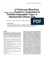 Efficacy of Home-Use Bleaching Agents Delivered in Customized or Prefilled Disposable Trays: A Randomized Clinical Trial