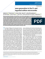 Photonic Microwave Generation in The X-And K-Band Using Integrated Soliton Microcombs