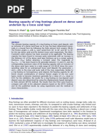 Bearing Capacity of Ring Footings Placed On Dense Sand Underlain by A Loose Sand Layer