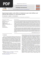 Experimentalstudies On The Effects of Reduction in Gear Tooth Stiffness Lubricant Film Thicknessina Spur Geared System