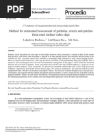 Method For Automated Assessment of Potholes, Cracks and Patches From Road Surface Video Clips