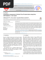 Orthodontic Management of Skeletal Class II Malocclusion Using Three Mini-Implants-A Case Report