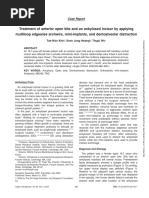 Treatment of Anterior Open Bite and An Ankylosed Incisor by Applying Multiloop Edgewise Archwire, Mini-Implants, and Dentoalveolar Distraction