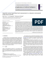 Capacitive sensor-based fluid level measurement in a dynamic environment using neural network