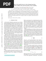 Anomalies in The Specific Heat of A Free Damped Particle: The Role of The Cutoff in The Spectral Density of The Coupling