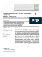 Achieving Hover Equilibrium in Free Flight With A Flexible Flapping Wing