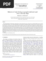 Behavior of Strip Footing On Geogrid-Reinforced Sand Over A Soft Clay Slope