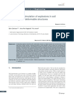 Modelling and Simulation of Explosions in Soil Interacting With Deformable Structures