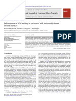 Article - 2011 - Sharifi Et Al. - Enhancement of PCM Melting in Enclosures With Horizontally-Finned Internal Surfaces