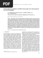 Strain Induced Anomalous Red Shift in Mesoscopic Iron Oxide Prepared by A Novel Technique