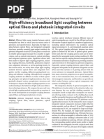 High-Efficiency Broadband Light Coupling Between Optical Fibers and Photonic Integrated Circuits