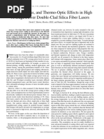 Thermal, Stress, and Thermo-Optic Effects in High Average Power Double-Clad Silica Fiber Lasers