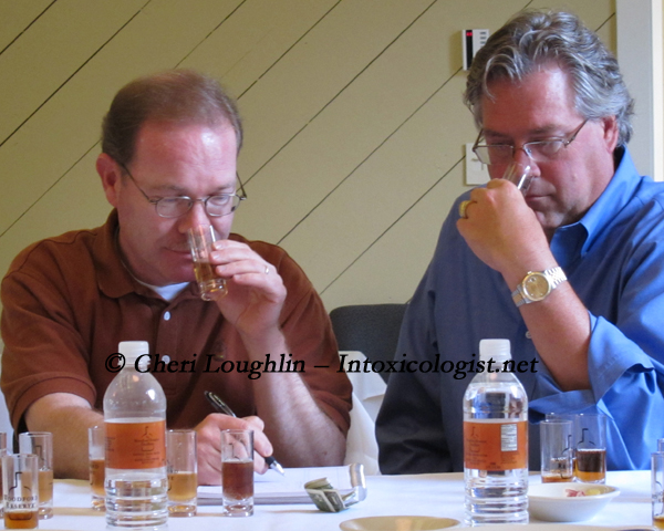 Chris Morris and Tim Laird Nosing the Cocktail Choices photo copyright Cheri Loughlin