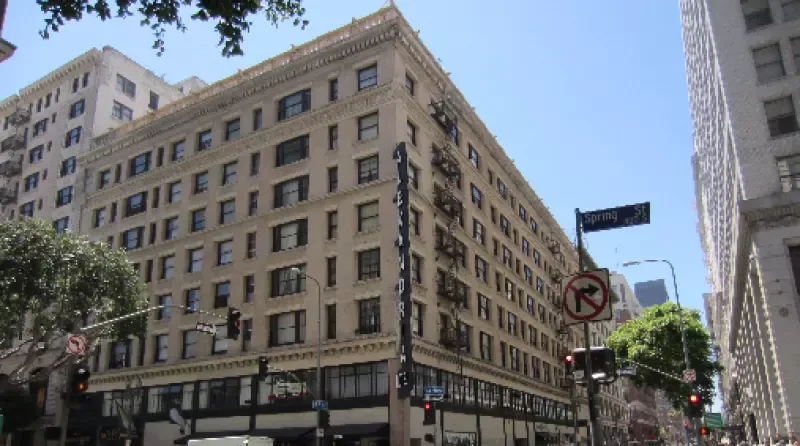 A large building with a no parking sign in front of it