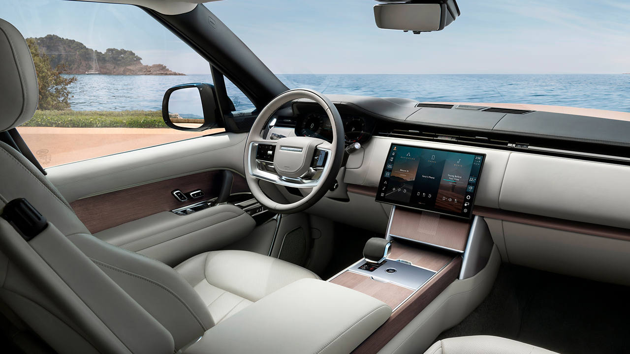 Range Rover interior dashboard and infotainment system.