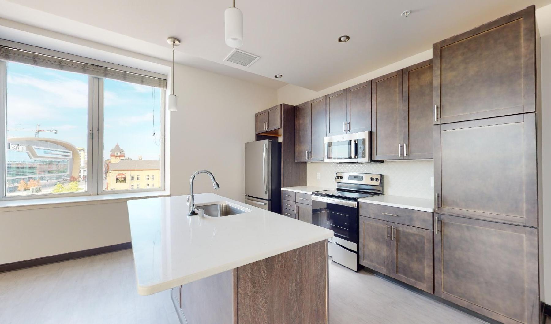 a kitchen with a large window