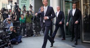 Prince Harry leaves the High Court after giving evidence in London, Wednesday, June 7, 2023. (AP Photo/Kin Cheung, File)