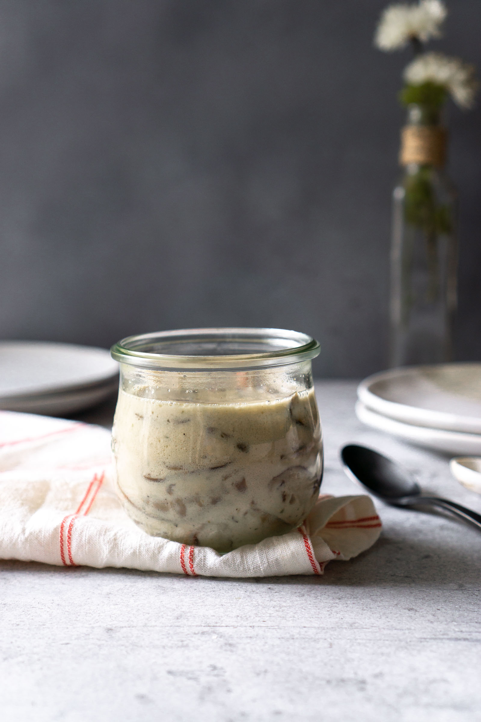 creamy mushroom sauce in a glass jar