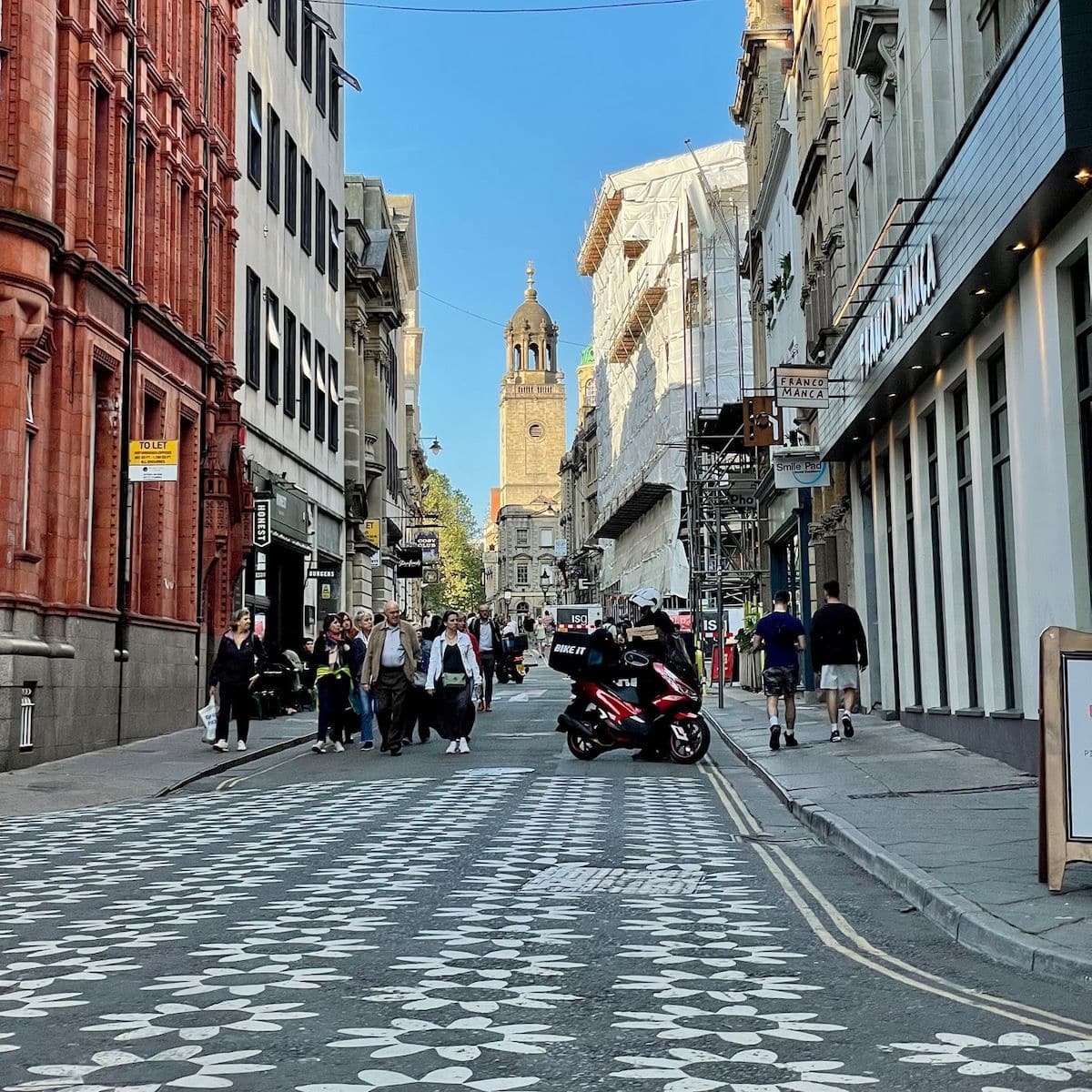 Busy street in historic city.