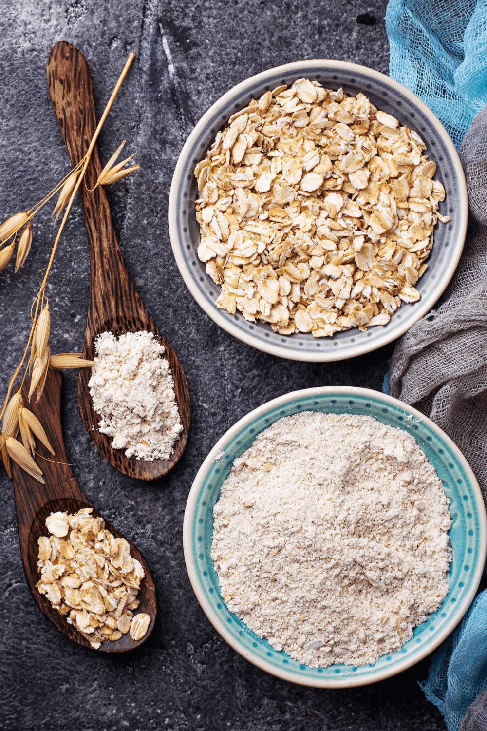 oat fiber and oats in 2 bowls with wooden spoons on side