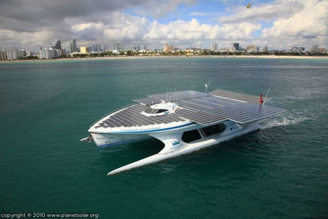 planet solar boat showing slide out solar panel 'wings'