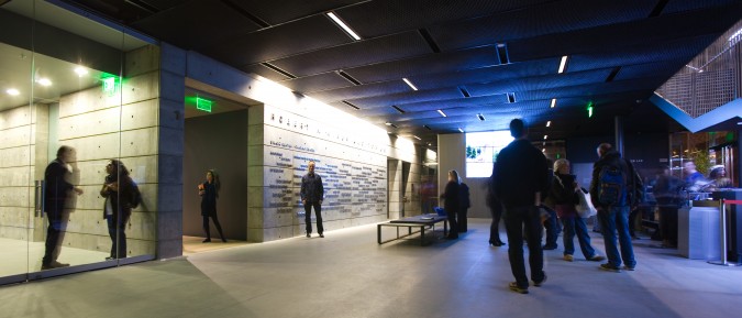 SFJAZZ Center, ground floor reception area, on opening night, January 21, 2013. Photographer and blogger Kevin Warnock is standing by the donor names on the wall.