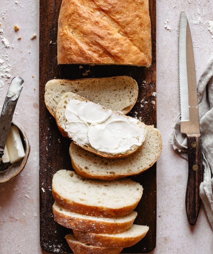 slices of bread on a cutting board.