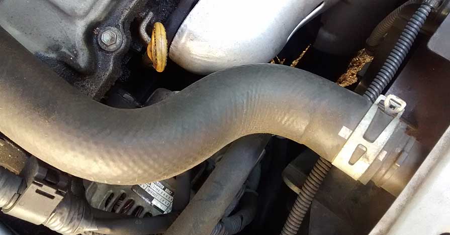 an upper radiator hose - Radiator Hose Collapse