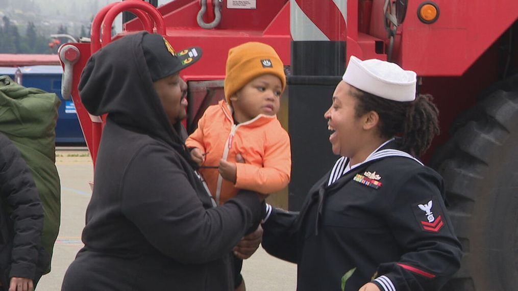 Kiara, reunited with her son and her husband Dar, when the USS KIDD when they returned from a long deployment, on May 6 2024. (KOMO News)