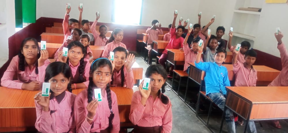 Students using clickers to interact with the Class Saathi app at school.