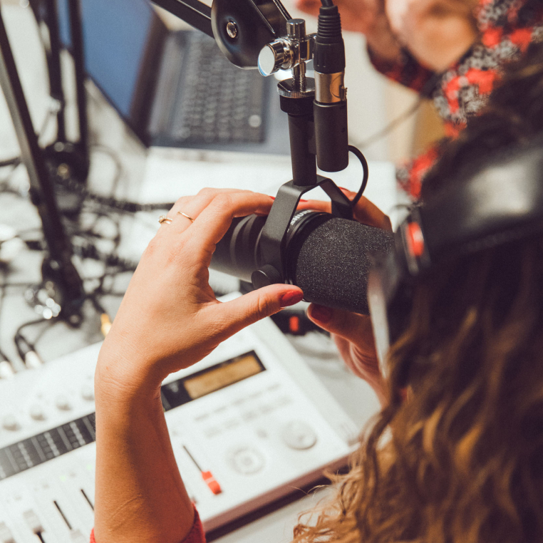 Woman Talking Radio Microphone