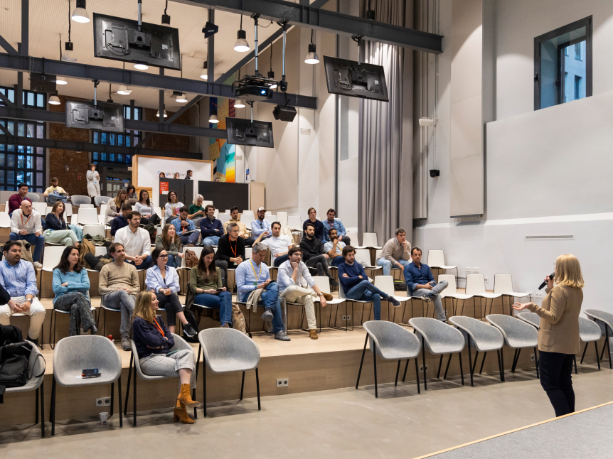 Audience listening to female speaker