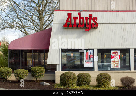 Beaverton, Oregon - Mar 12, 2019: The exterior of an Arby's restaurant. Arby's is an American quick-service fast-food sandwich restaurant chain. Stock Photo