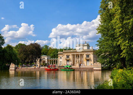 Warsaw, Poland - August 9, 2019: Palace on the Isle and lake in Royal Lazienki Park, Neoclassical  style city landmark Stock Photo