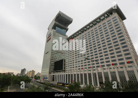 --FILE--The 44-story No 5 building of the Pangu Plaza, a prominent dragon-shaped building, is seen in Beijing, China, 12 October 2014. The auction of Stock Photo