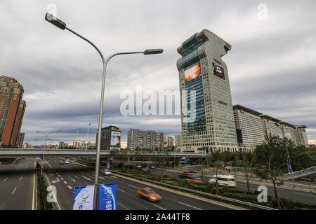 --FILE--The 44-story No 5 building of the Pangu Plaza, a prominent dragon-shaped building, is seen in Beijing, China, 12 October 2014. The auction of Stock Photo